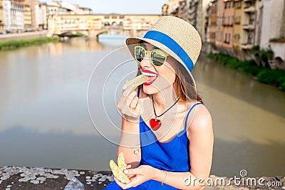 Tourist with cantuccini cookie in florence Stock Photo