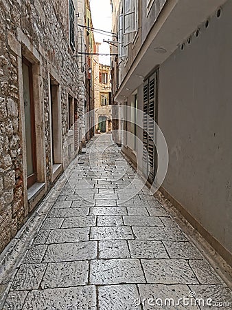 Tourist city by the Adratic sea - Sibenik, Croatia. The old stones, narrow street and stairs Stock Photo