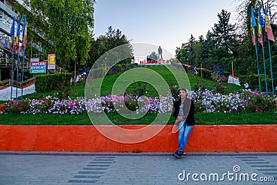 Tourist in the city center with a monument to Kotovsky. September 5, 2021 Hincesti Moldova Editorial Stock Photo