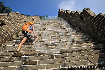 tourist climbing to the top of greatwall enjoy the view Stock Photo