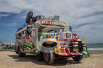 Tourist on a colourful Jeepney Editorial Stock Photo