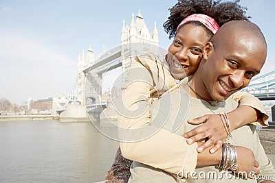 Tourist couple in London with map. Stock Photo