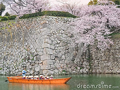 Tourist cruise boat on a canals around Himeji Castle. Editorial Stock Photo