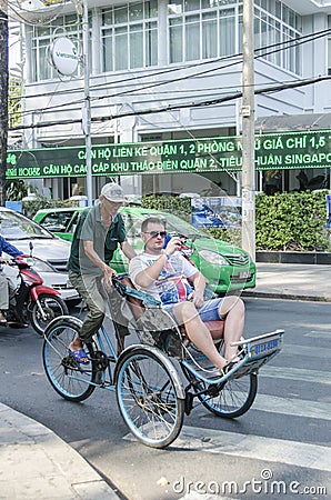 Tourist on cyclo Vietnam Editorial Stock Photo