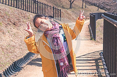 Tourist Family walking up to the Chureito Pagoda shrine to view the Fuji Mountain Stock Photo