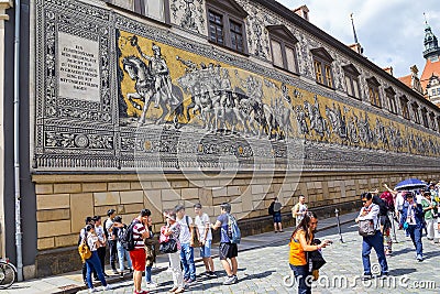 Tourist in front of Procession of Princes in Dresden Editorial Stock Photo