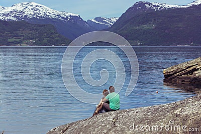 Tourist girl at the Hardangerfjorden Stock Photo