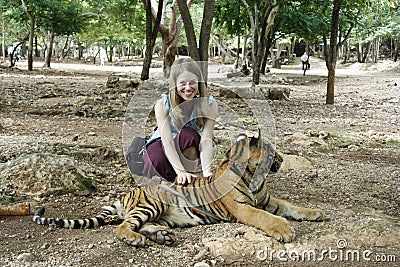 Tourist girl and Tiger Stock Photo