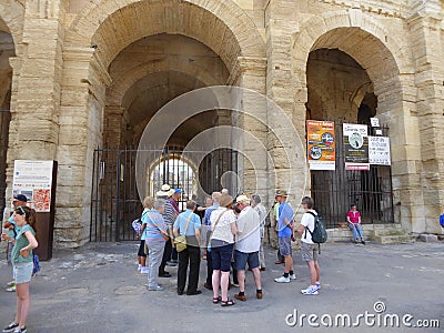 Tourist group outside Roman amphitheatre Editorial Stock Photo