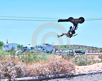 Tourist having The Ride Of His Life On A Zipline Editorial Stock Photo