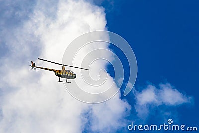 Tourist helicopter flies over the Caribbean Sea in Mexico Stock Photo