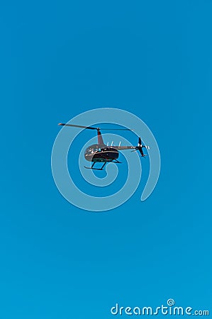 Tourist helicopter, rented to fly over a tropical beach Editorial Stock Photo