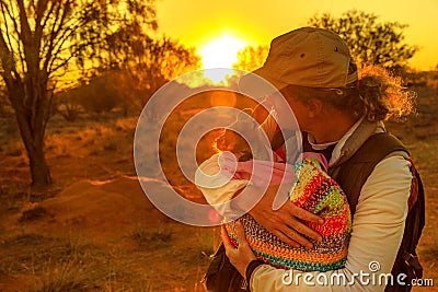 Tourist holding baby kangaroo Stock Photo