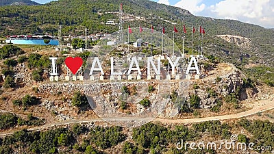 Tourist inscription love city. Clip. Top view of tourist inscription signifying love of city. Inscription I love Alanya Stock Photo