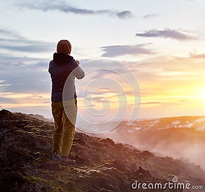 Tourist on lava fields Stock Photo