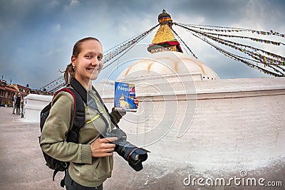 Tourist with Lonely Planet guide in Nepal Editorial Stock Photo