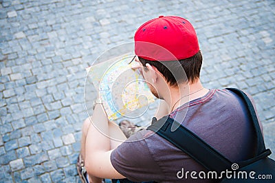 Tourist looking at a map Stock Photo
