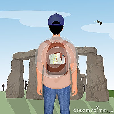 Tourist man visits the archaeological site of Stonehenge Stock Photo