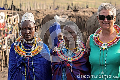 Tourist and Masai woman in Tanzania Editorial Stock Photo