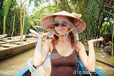 Tourist at Mekong delta cruise Stock Photo