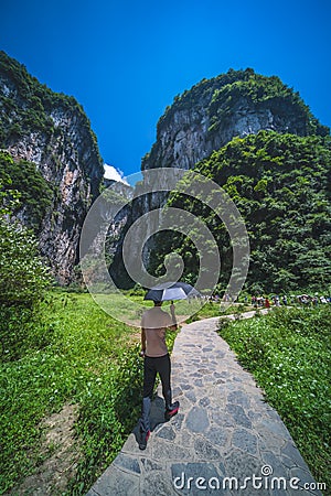 Tourist on the path in Wulong National Park Editorial Stock Photo