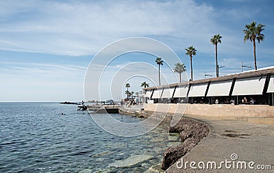 Tourist people resting in a coffee shop at the beach. Paphos city cyprus europe Editorial Stock Photo