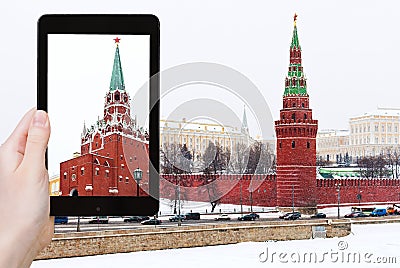 Tourist photographs Kremlin in winter snowing day Stock Photo