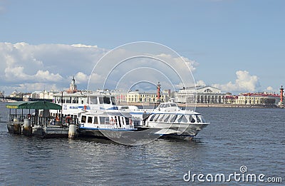 Tourist pier on the background of the spit of Vasilyevsky island. Saint Petersburg Editorial Stock Photo