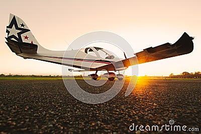 A tourist plane stops on the runway Stock Photo