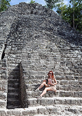 The tourist in pyramid ruins Mexico. Stock Photo