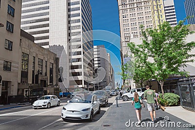 Tourist and resident walking along clean street in downtown Dallas, Texas Editorial Stock Photo