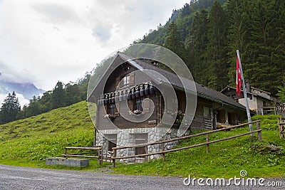 Tourist shelter. Wooden historic Swiss house. Alps. Switzerland Stock Photo