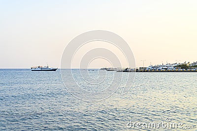 Tourist ship transporting people to the sea returns to port. Editorial Stock Photo