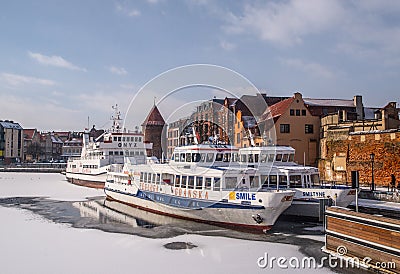 Tourist ships in winter in GdaÅ„sk mooring Editorial Stock Photo
