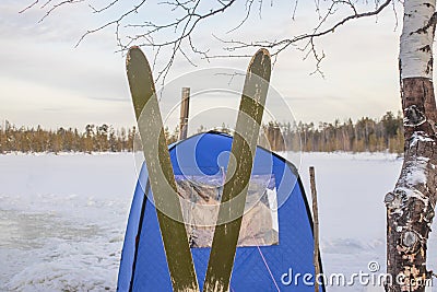 Tourist skis. Warm tourist tent Stock Photo