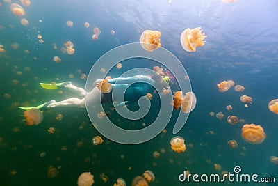 Tourist snorkeling in Jellyfish Lake Stock Photo