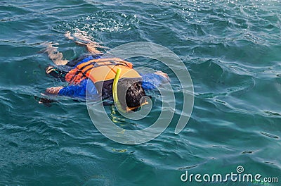 Tourist snorkeling with life jackets in andaman sea Stock Photo