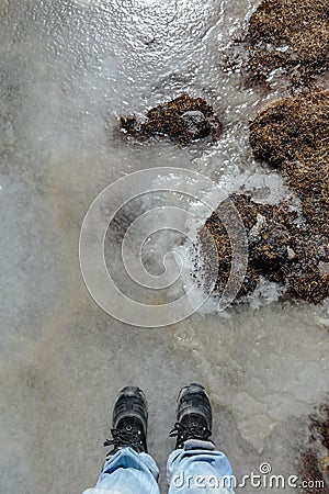 Tourist stand on frozen pond in winter in Zero Point at Lachung. North Sikkim, India Stock Photo