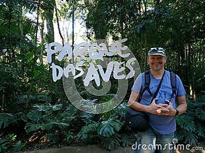 Tourist standing at Parque Das Aves Editorial Stock Photo