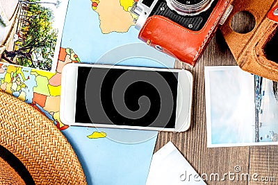 tourist stuff with camera and map on wooden background top view Stock Photo