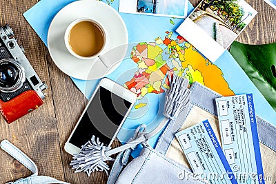 tourist stuff with map and tickets on wooden background top view Stock Photo