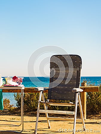 Tourist table and chair on seaside, camping Stock Photo