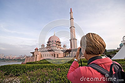 Tourist taking photo of Putra Mosque, Malaysia Stock Photo