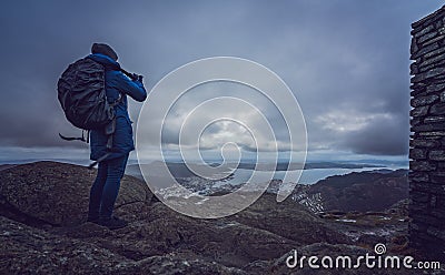 Tourist taking pictures on Mount Ulriken Stock Photo