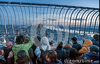 Tourist taking pictures at the view point building in New York Editorial Stock Photo