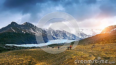 Tourist taking in Skaftafell glacier, Vatnajokull National Park in Iceland Stock Photo