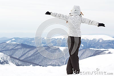 Tourist at the top of the mountain, symbol of freedom Stock Photo