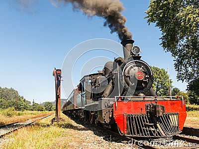 Tourist train called Valdiviano that runs from Valdivia to Antilhue with a 1913 North British locomotive type 57. Los Rios Region Editorial Stock Photo