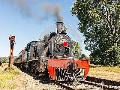 Tourist train called Valdiviano that runs from Valdivia to Antilhue with a 1913 North British locomotive type 57. Los Rios Region Editorial Stock Photo