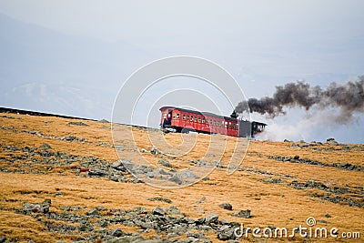 Tourist Train on Mt Washington in a Fall Cloudy Day Stock Photo